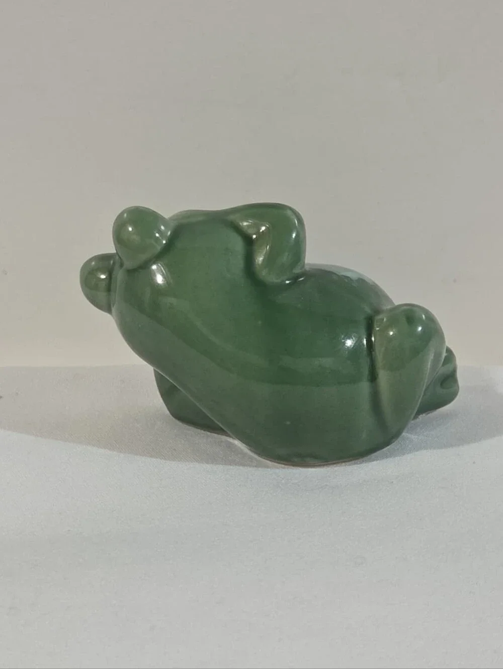 ceramic posing frog figurine
